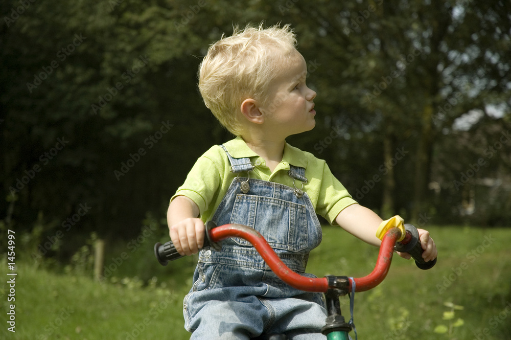 little kid on bike little kid on bike