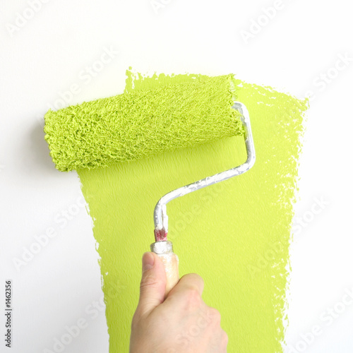 Fototapeta Naklejka Na Ścianę i Meble -  painting a wall in lime green