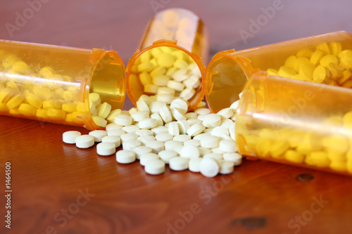 four bottles of medicine side by side