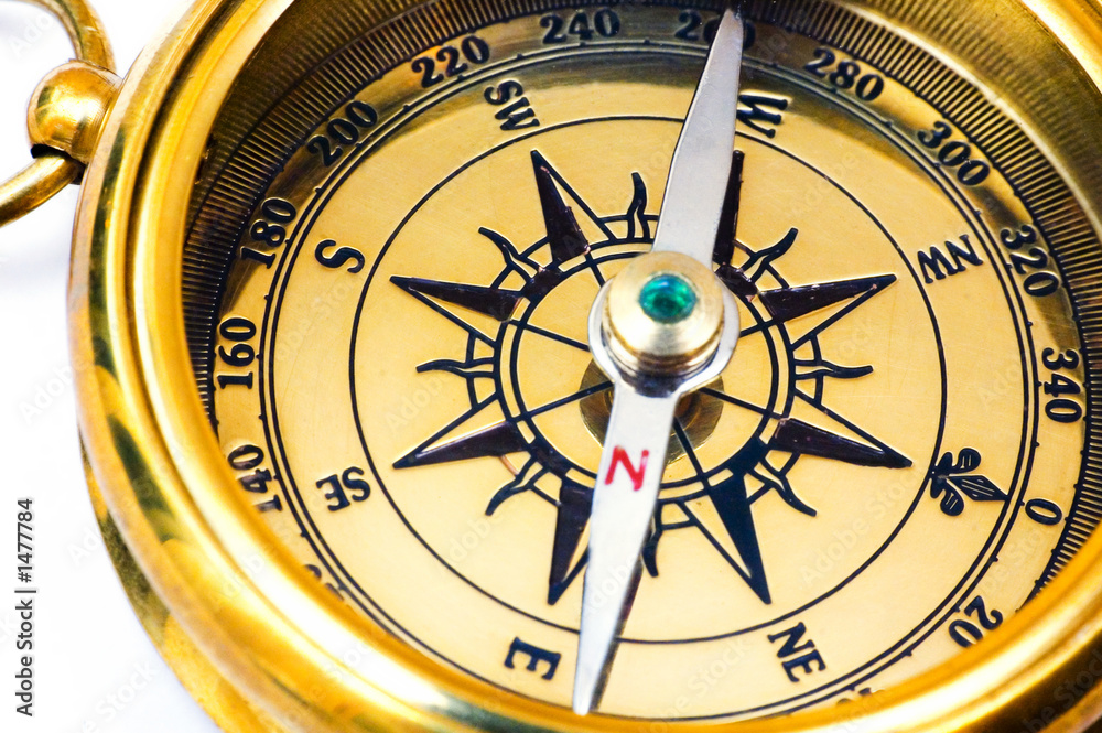 Obraz premium old style gold compass on white background