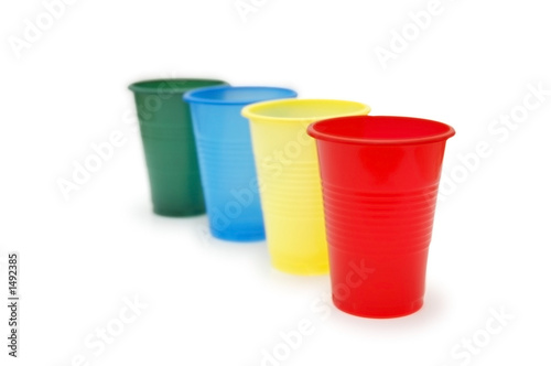 four colourful plastic throwaway cups © Elnur