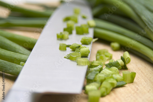 chopping spring onions for a salad