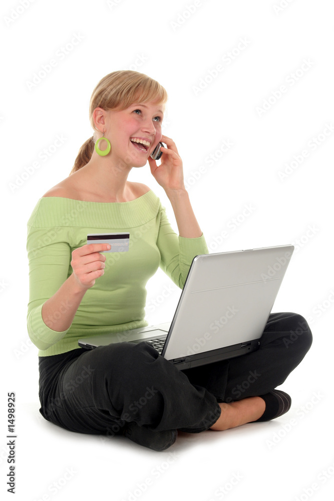 woman shopping online, talking on the phone woman shopping online, talking on the phone