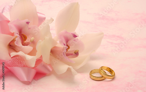 Fototapeta Naklejka Na Ścianę i Meble -  orchid and wedding rings