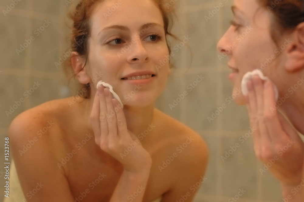 young woman in front of the mirror young woman in front of the mirror