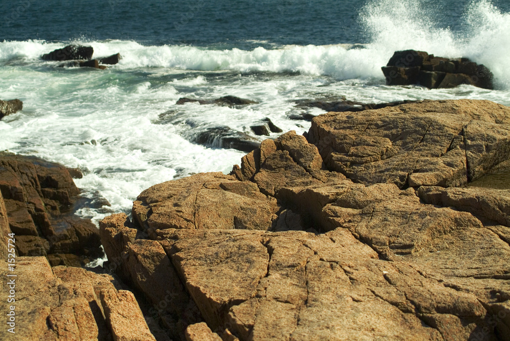 large waves crashinng onto pink granite coast large waves crashinng onto pink granite coast