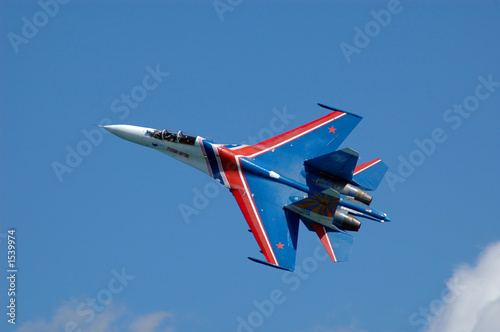 su-27 crossing sky photo