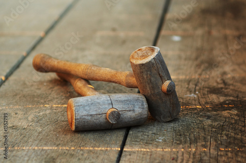 two wooden hammers