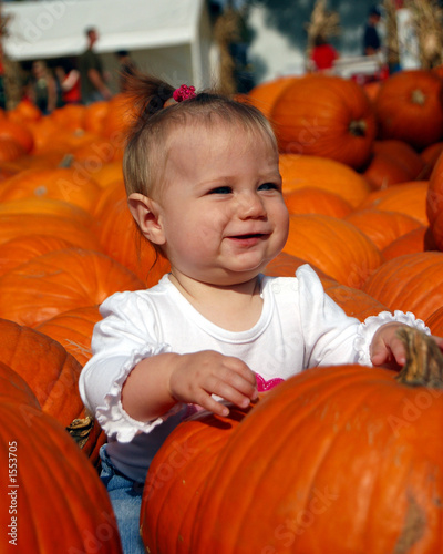 baby in pumpkin patch 1