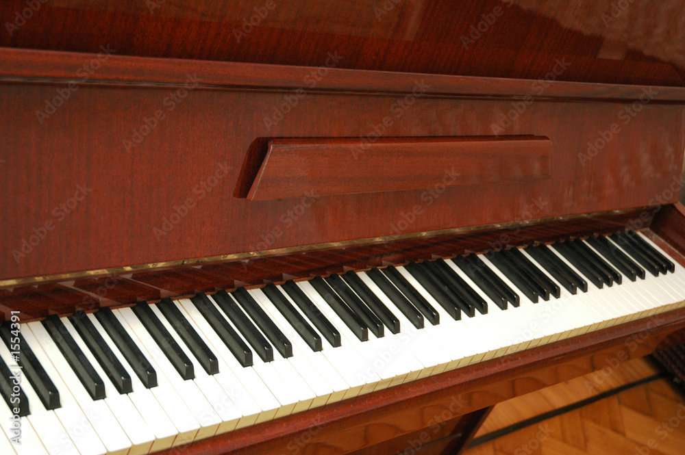 piano with polished wooden finishing piano with polished wooden finishing