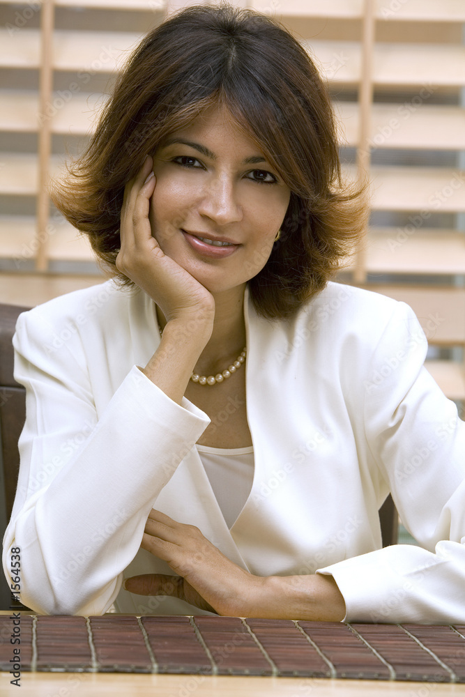 business woman wearing white suit business woman wearing white suit