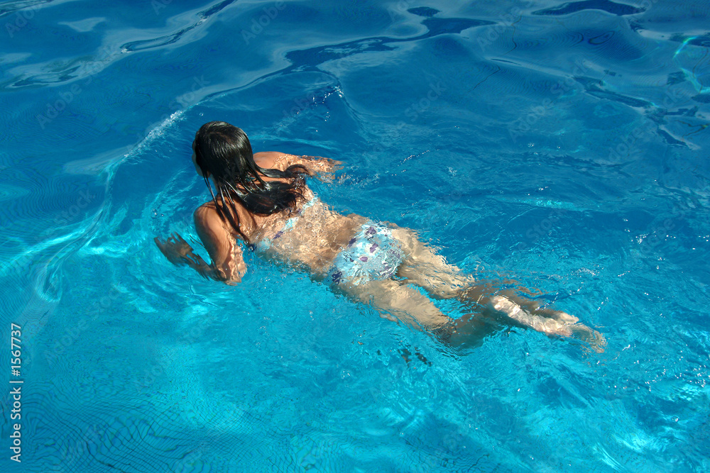 girl swimming in pool