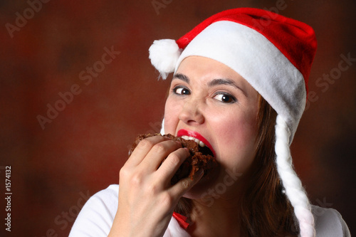 Bilde på lerret santa girl eating cake