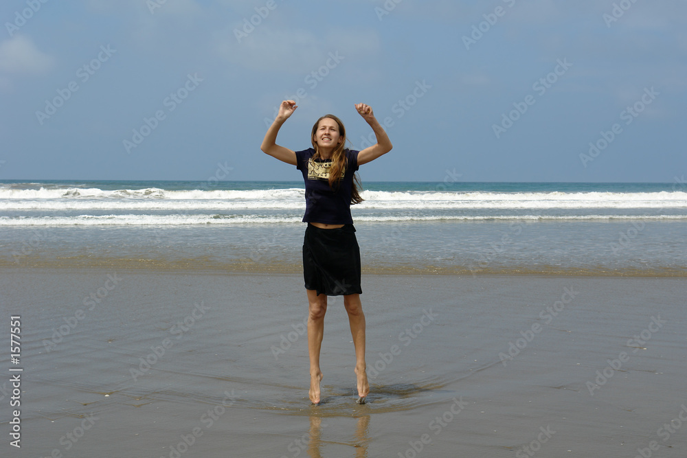 jumping girl on the beach