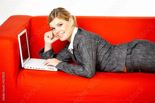 woman on red couch photo