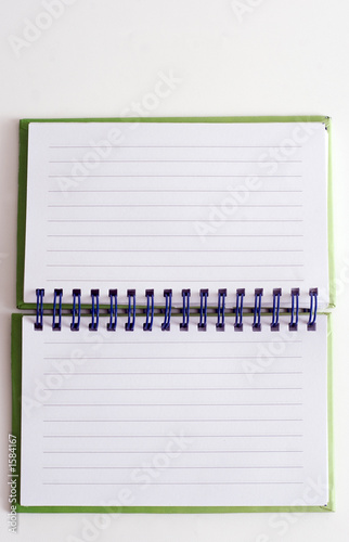 spiral bound note pad on white background
