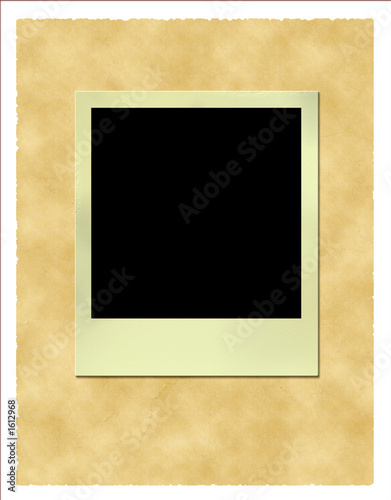 old polaroid frame at vitage paper background