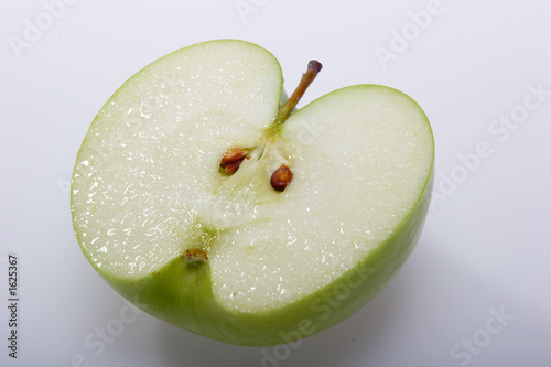 fruit, a green apple, with a tail
