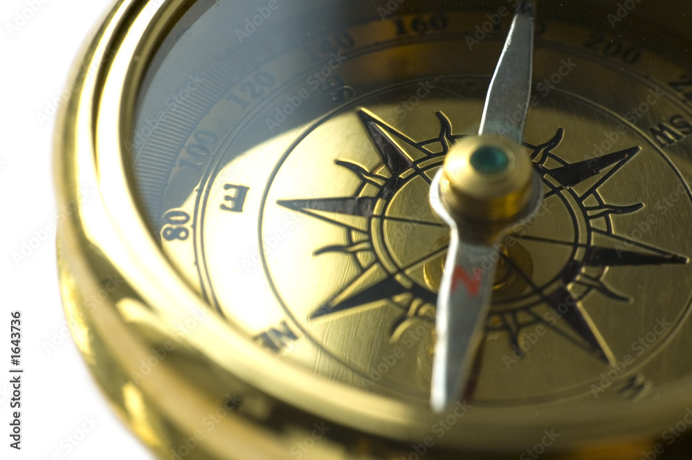 Fototapeta premium old style gold compass on white background