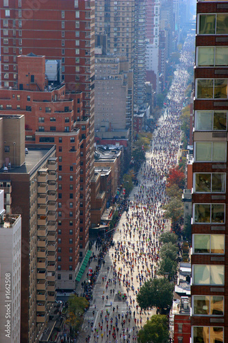 people running down the street in a marathon