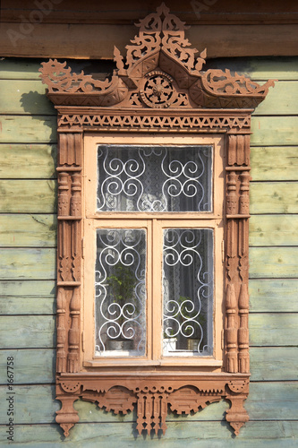 carved wooden window frame photo