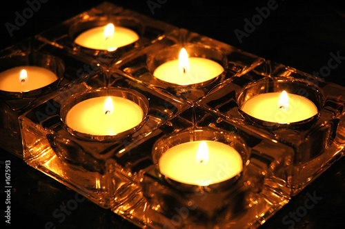 six burning candles © Warren Millar