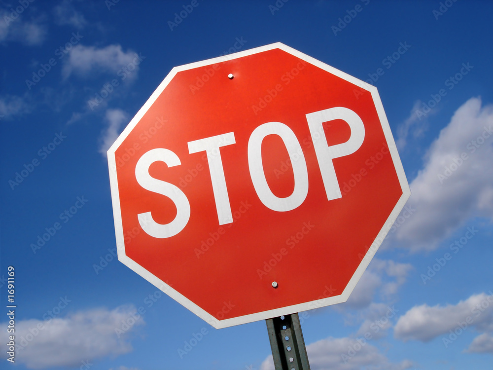 stop sign against blue sky - obrazy, fototapety, plakaty 