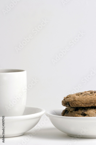 coffee and stack of chocolate chips cookies