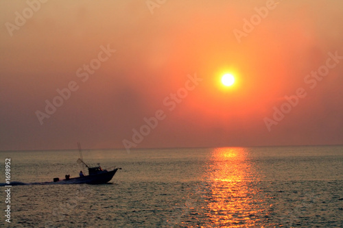 sunset speedboat