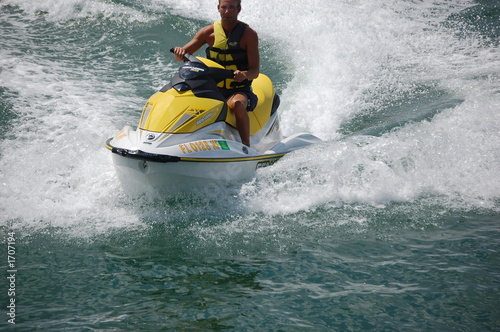 man on a yellow jetski