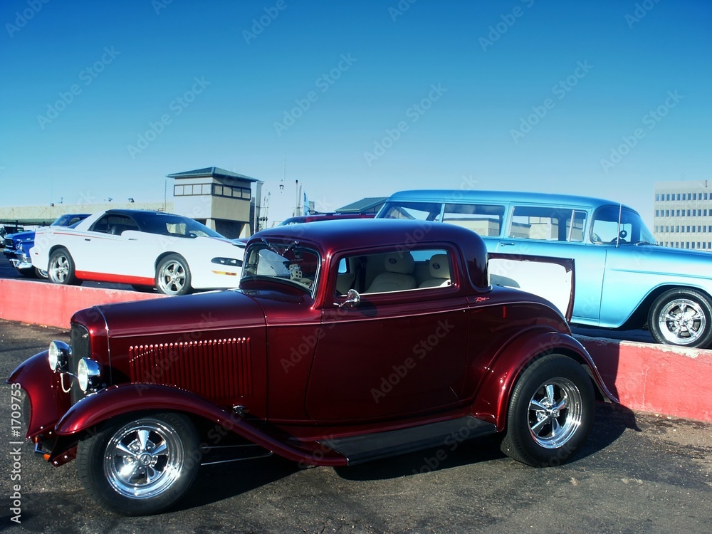 classic red hot rod at a car show