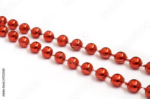 red beads on white background