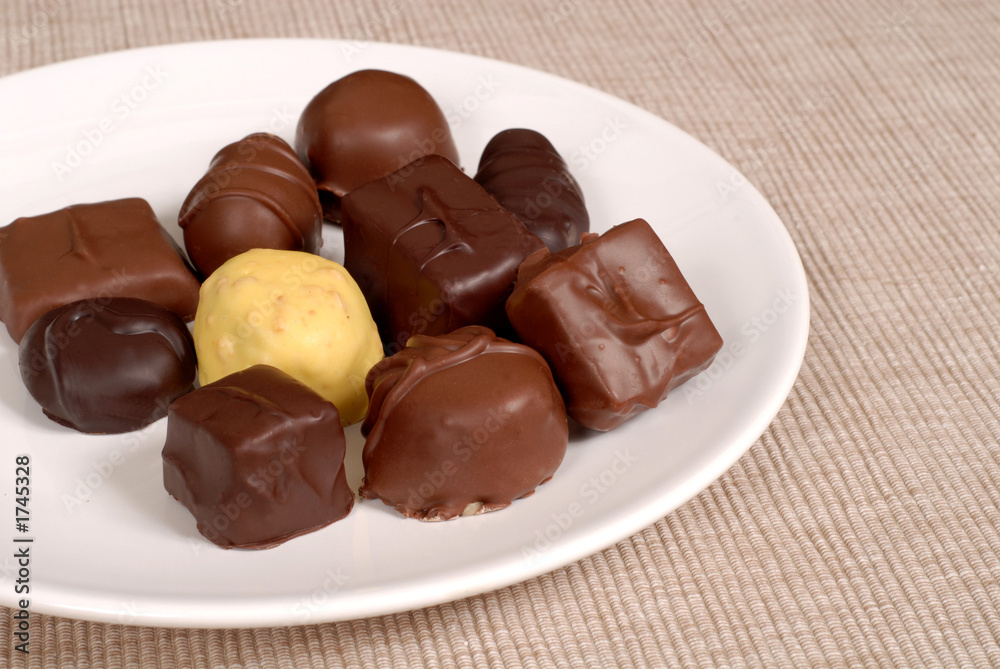 variety of chocolates on a white plate