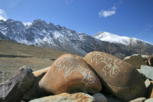 mani stones (stones with buddhistic inscriptions) photo