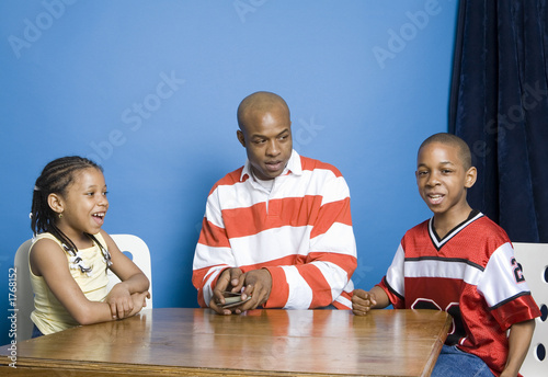 happy family playing cards