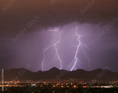 lightning over the city and mountains