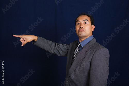 business suit man pointing photo