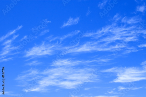 blue sky with delicate clouds