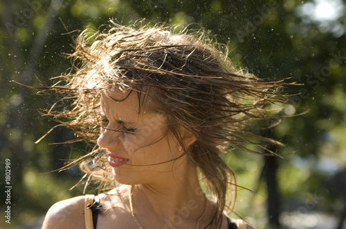 young model shaking her head dry