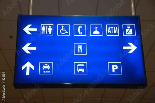 lighted sign board in airport