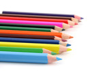 colored pencils on a white background with a shallow dof