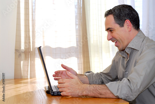 man with laptop photo