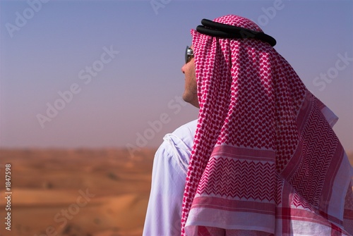 arabic man in liwa desert photo