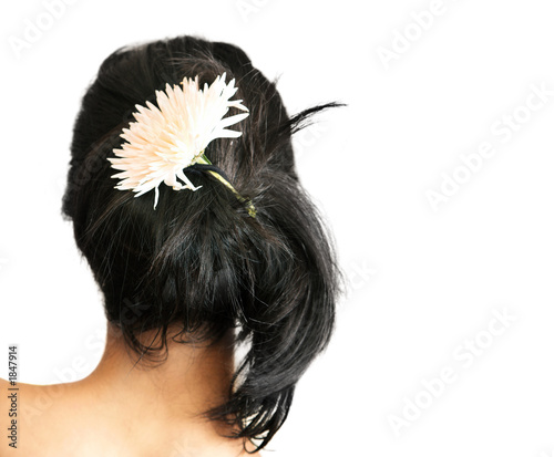 woman with flower in hair