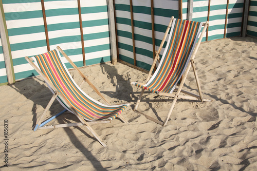 beach scene: striped deck chairs photo