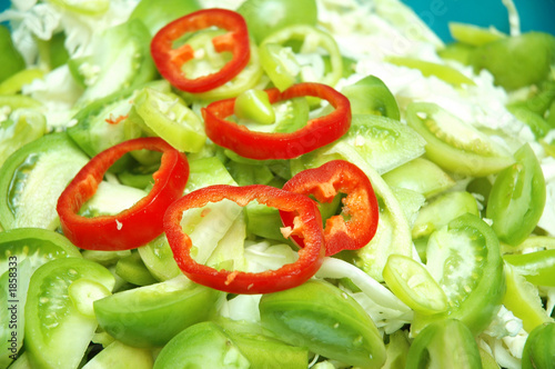 green tomatoes and red sliced peppers
