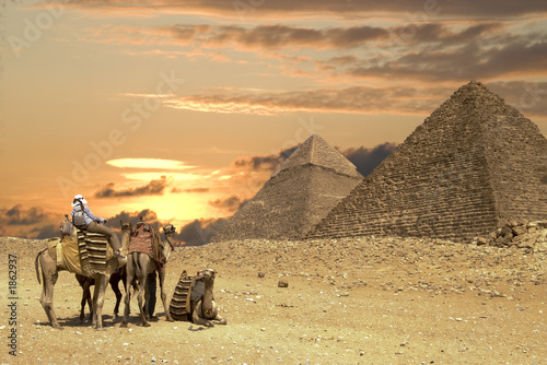 people ath the great pyramids photo