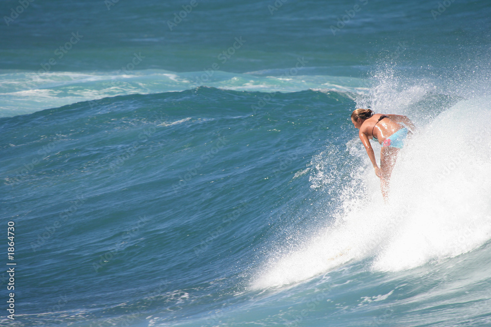 young woman on a surfboard