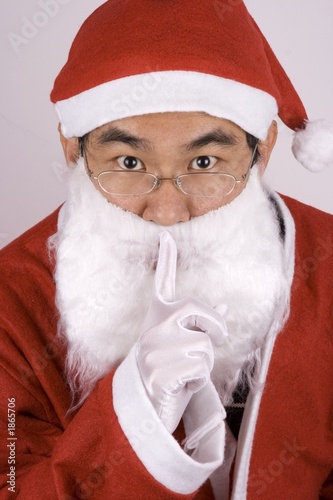 asian santa claus whispering photo