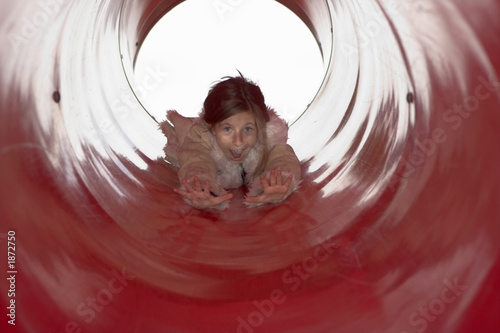 girl in tube slide